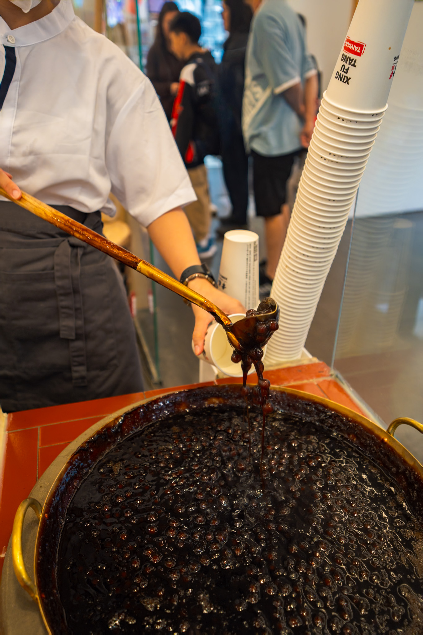 Boba pearls being poured at Xing Fu Tang